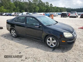 2009 Volkswagen Jetta SE z VIN 3VWRM71K49M055000, wystawiony jako Copart lot #54450045 z przebiegiem 163 451 mil mil oraz Szkoda całkowita • Salvage title. Historia ofert i sprzedaży dostępna na DreamBid. Obrazek 4.