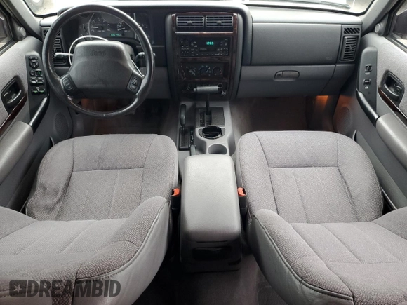 1997 Jeep Cherokee Country with VIN 1J4FJ78S9VL576899, listed as a Copart auction lot 82303584 with 335,746 mi miles and Salvage Title. Bid and sale history available at carsss.com. Image 8.