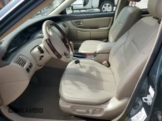 2003 Toyota Avalon XL z VIN 4T1BF28B43U322481, wystawiony jako Copart lot #51876905 z przebiegiem 135 237 mil mil oraz Szkoda całkowita • Salvage title. Historia ofert i sprzedaży dostępna na DreamBid. Obrazek 7.