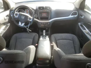 2016 Dodge Journey SE with VIN 3C4PDCABXGT103296, listed as a Copart auction lot 56358715 with 106,821 mi miles and Clean Title. Bid and sale history available at DreamBid. Image 8.