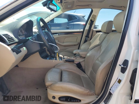2005 BMW 3 Series 330i with VIN WBAEV53455KM41084, listed as a Copart auction lot 50338425 with 223,116 mi miles and Salvage title. Bid and sale history available at DreamBid. Image 7.
