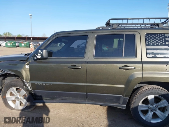 2016 Jeep Patriot High Altitude Edition with VIN 1C4NJRFB4GD581179, listed as a IAAI auction lot 42101912 with 168,254 mi miles. Bid and sale history available at carsss.com. Image 14.