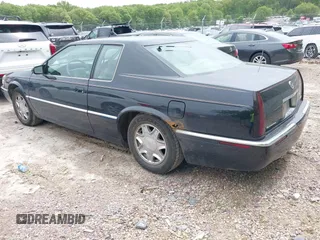 2002 Cadillac Eldorado ESC z VIN 1G6EL12Y82B105241, wystawiony jako IAAI lot #42241609 z przebiegiem 90 442 mil mil oraz . Historia ofert i sprzedaży dostępna na DreamBid. Obrazek 3.