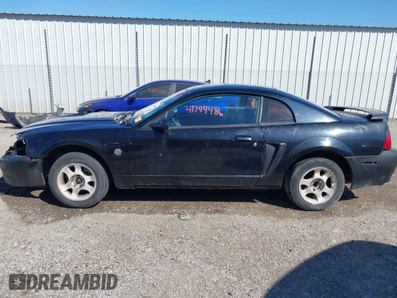 2004 Ford Mustang Standard with VIN 1FAFP40604F156534, listed as a IAAI auction lot 41794486 with 216,207 mi miles. Bid and sale history available at carsss.com. Image 15.