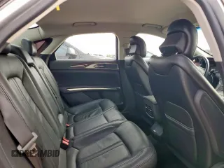2014 Lincoln MKZ z VIN 3LN6L2G90ER815819, wystawiony jako Copart lot #61189515 z przebiegiem 101 148 mil mil oraz Szkoda całkowita • Salvage title. Historia ofert i sprzedaży dostępna na DreamBid. Obrazek 10.