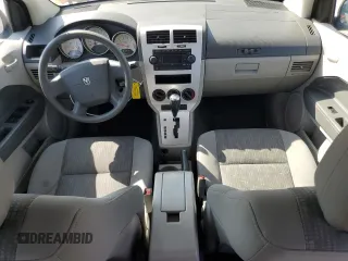 2007 Dodge Caliber SXT z VIN 1B3HB48B77D340860, wystawiony jako Copart lot #55637705 z przebiegiem 152 933 mil mil oraz Czysty tytuł • Clean title. Historia ofert i sprzedaży dostępna na DreamBid. Obrazek 8.