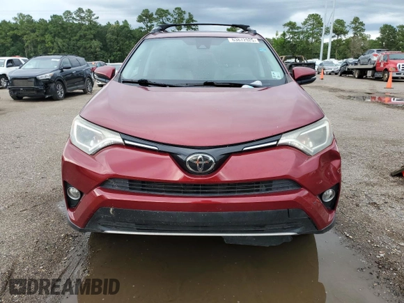 2018 Toyota RAV4 XLE with VIN 2T3WFREV7JW464160, listed as a Copart auction lot 63872925 with 70,826 mi miles and Salvage title. Bid and sale history available at DreamBid. Image 5.