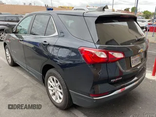 2021 Chevrolet Equinox LT z VIN 3GNAXJEV5MS121509, wystawiony jako IAAI lot #42480012 z przebiegiem 59 031 mil mil oraz . Historia ofert i sprzedaży dostępna na DreamBid. Obrazek 2.