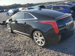 2014 Cadillac ELR z VIN 1G6RL1E4XEU602018, wystawiony jako Copart lot #74824784 z przebiegiem 90 159 mil mil oraz Tytuł czysty. Historia ofert i sprzedaży dostępna na DreamBid. Obrazek 2.