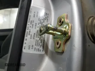 2005 Suzuki Forenza S z VIN KL5JD56Z85K195763, wystawiony jako Copart lot #75531224 z przebiegiem 33 368 mil mil oraz Szkody całkowita. Historia ofert i sprzedaży dostępna na DreamBid. Obrazek 13.