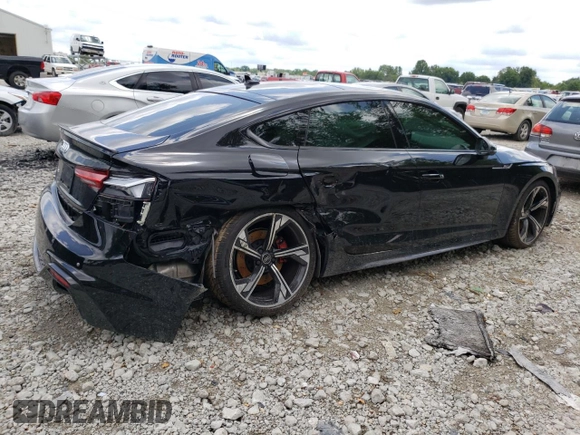 2023 Audi RS 5 Sportback z VIN WUAAWCF5XPA900600, wystawiony jako Copart lot #58295863 z przebiegiem 4808 mil mil oraz . Historia ofert i sprzedaży dostępna na DreamBid. Obrazek 3.