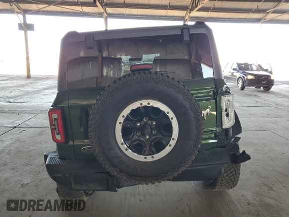2023 Ford Bronco with VIN 1FMEE5DP9PLB29838, listed as a Copart auction lot 62409785 with 11,124 mi miles and Salvage title. Bid and sale history available at DreamBid. Image 6.