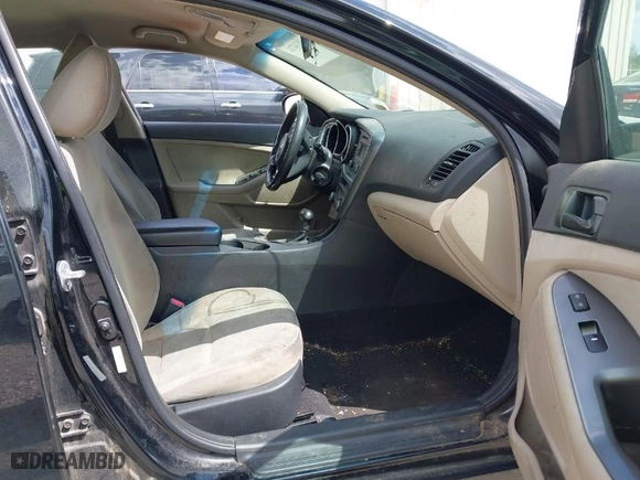 2015 Kia Optima LX with VIN 5XXGM4A77FG487033, listed as a IAAI auction lot 41974724 with 173,451 mi miles. Bid and sale history available at carsss.com. Image 5.