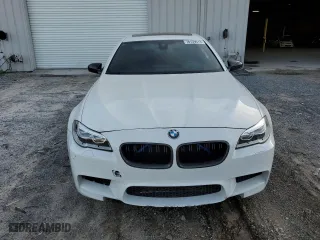 2016 BMW M5 with VIN WBSFV9C56GD595472, listed as a Copart auction lot 78139613 with 52,135 mi miles. Bid and sale history available at carsss.com. Image 5.