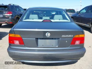 2000 BMW 5 Series 528iA with VIN WBADM6343YGV01651, listed as a IAAI auction lot 41745574 with 143,898 mi miles. Bid and sale history available at carsss.com. Image 16.