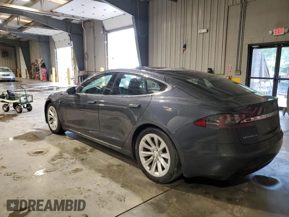 2017 Tesla Model S 100D with VIN 5YJSA1E29HF210731, listed as a Copart auction lot 56762565 with 114,117 mi miles and Salvage title. Bid and sale history available at DreamBid. Image 2.
