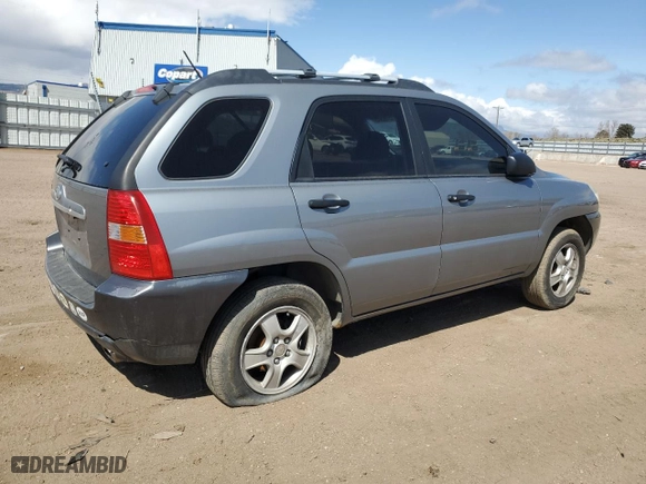 2007 Kia Sportage LX with VIN KNDJF724277378611, listed as a Copart auction lot 51516305 with 150,856 mi miles and Salvage Title. Bid and sale history available at carsss.com. Image 3.