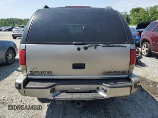 1999 Chevrolet Blazer Trailblazer z VIN 1GNDT13W1X2169254, wystawiony jako Copart lot #55021105 z przebiegiem 158 169 mil mil oraz Szkody całkowita. Historia ofert i sprzedaży dostępna na DreamBid. Obrazek 6.