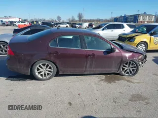 2012 Ford Fusion SEL z VIN 3FAHP0JA7CR302871, wystawiony jako IAAI lot #41694603 z przebiegiem 104 104 mil mil oraz . Historia ofert i sprzedaży dostępna na DreamBid. Obrazek 13.