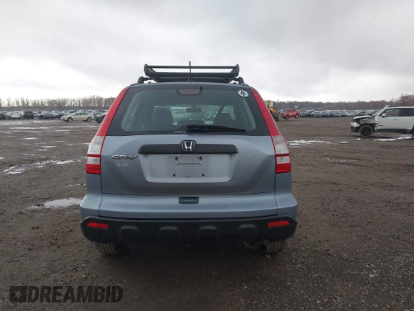 2009 Honda CR-V LX with VIN 5J6RE48339L016522, listed as a IAAI auction lot 40783609 with 209,891 mi miles. Bid and sale history available at carsss.com. Image 16.