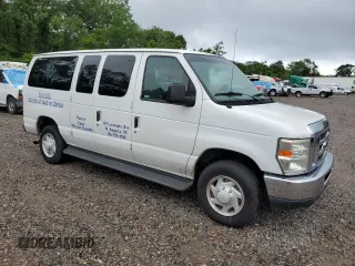 2009 Ford Econoline Passenger XL with VIN 1FBNE31L49DA74498, listed as a Copart auction lot 56381945 with 95,695 mi miles and Salvage title. Bid and sale history available at DreamBid. Image 4.