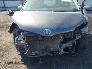 2016 Toyota Sienna LE with VIN 5TDJK3DC9GS130774, listed as a IAAI auction lot 42033495 with 228,289 mi miles. Bid and sale history available at carsss.com. Image 6.