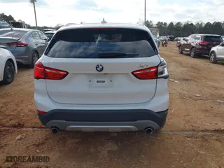 2018 BMW X1 sDrive28i with VIN WBXHU7C37J5H39401, listed as a IAAI auction lot 41421610 with 94,576 mi miles. Bid and sale history available at carsss.com. Image 16.