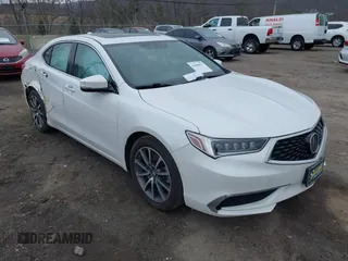 2019 Acura TLX z VIN 19UUB3F33KA007148, wystawiony jako IAAI lot #41889013 z przebiegiem 97 654 mil mil oraz . Historia ofert i sprzedaży dostępna na DreamBid. Obrazek 1.