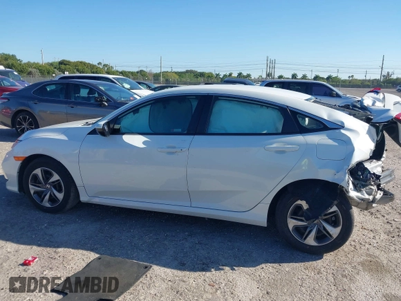 2020 Honda Civic LX z VIN 19XFC2F68LE206395, wystawiony jako IAAI lot #41720356 z przebiegiem 38 037 mil mil oraz . Historia ofert i sprzedaży dostępna na DreamBid. Obrazek 15.