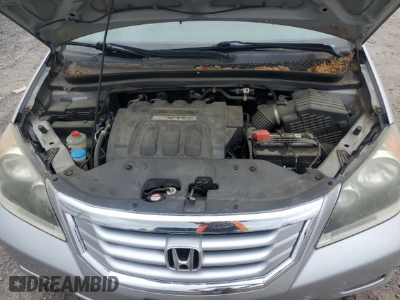 2010 Honda Odyssey LX z VIN 5FNRL3H29AB016853, wystawiony jako Copart lot #56602085 z przebiegiem 154 518 mil mil oraz Szkoda całkowita • Salvage title. Historia ofert i sprzedaży dostępna na DreamBid. Obrazek 12.