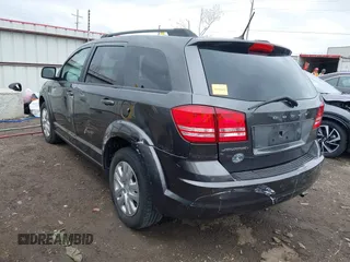 2017 Dodge Journey SE with VIN 3C4PDCAB9HT603595, listed as a IAAI auction lot 41914690 with 104,960 mi miles and . Bid and sale history available at DreamBid. Image 3.
