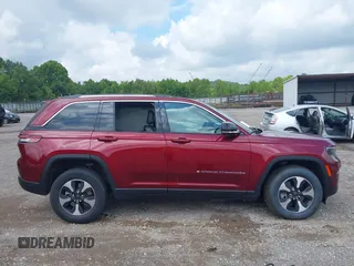 2023 Jeep Grand Cherokee with VIN 1C4RJYB60PC649357, listed as a IAAI auction lot 42707549 with 50,441 mi miles and . Bid and sale history available at DreamBid. Image 13.
