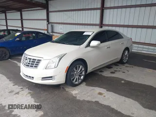 2014 Cadillac XTS Luxury with VIN 2G61M5S31E9210460, listed as a IAAI auction lot 41602087 with 1 mi miles. Bid and sale history available at carsss.com. Image 2.