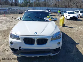 2015 BMW X1 sDrive28i with VIN WBAVM1C53FV317173, listed as a IAAI auction lot 41586385 with 146,068 mi miles. Bid and sale history available at carsss.com. Image 12.