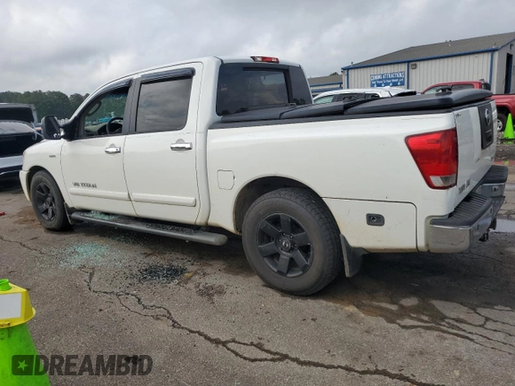 2006 Nissan Titan LE with VIN 1N6BA07A76N551183, listed as a Copart auction lot 53804515 with 216,816 mi miles and Salvage title. Bid and sale history available at DreamBid. Image 2.