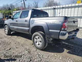 2014 Toyota Tacoma with VIN 3TMLU4ENXEM135620, listed as a Copart auction lot 52013405 with 230,005 mi miles and Salvage Title. Bid and sale history available at DreamBid. Image 2.
