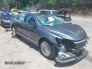 2016 Volkswagen Passat SE with VIN 1VWBT7A39GC043856, listed as a IAAI auction lot 42648010 with 106,106 mi miles and . Bid and sale history available at DreamBid. Image 1.