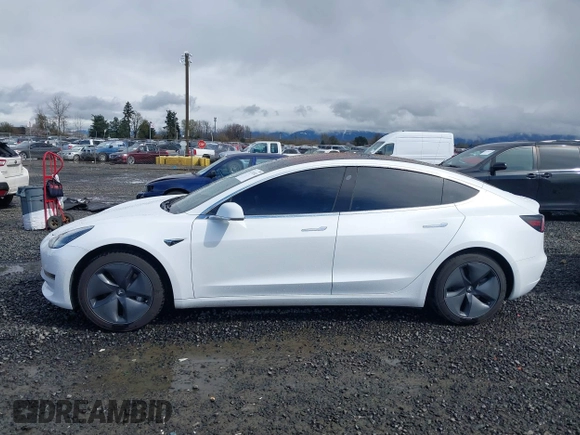 2018 Tesla Model 3 Long Range Battery with VIN 5YJ3E1EA3JF013253, listed as a IAAI auction lot 41752102 with 84,459 mi miles. Bid and sale history available at carsss.com. Image 14.
