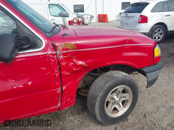 2003 Mazda B-Series 2WD Truck SE with VIN 4F4YR46V33TM13768, listed as a IAAI auction lot 41351910 with 212,641 mi miles. Bid and sale history available at carsss.com. Image 13.