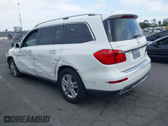 2014 Mercedes-Benz GL 450 z VIN 4JGDF7CE0EA424081, wystawiony jako IAAI lot #42359465 z przebiegiem 145 363 mil mil oraz . Historia ofert i sprzedaży dostępna na DreamBid. Obrazek 3.