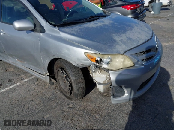 2011 Toyota Corolla L with VIN JTDBU4EE7BJ108265, listed as a IAAI auction lot 41969221 with 104,273 mi miles. Bid and sale history available at carsss.com. Image 6.