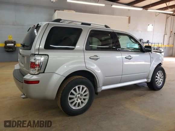 2009 Mercury Mariner Premier z VIN 4M2CU87GX9KJ17731, wystawiony jako Copart lot #54204855 z przebiegiem 54 521 mil mil oraz Szkody całkowita. Historia ofert i sprzedaży dostępna na DreamBid. Obrazek 3.