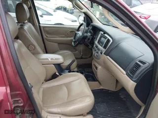 2003 Mazda Tribute ES with VIN 4F2CZ96113KM50496, listed as a IAAI auction lot 41929251 with 187,755 mi miles. Bid and sale history available at carsss.com. Image 5.