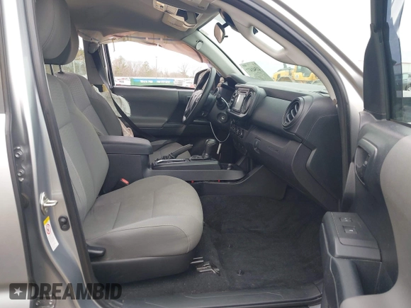 2018 Toyota Tacoma SR with VIN 3TMCZ5AN4JM130307, listed as a IAAI auction lot 41541477 with 74,369 mi miles and . Bid and sale history available at DreamBid. Image 5.