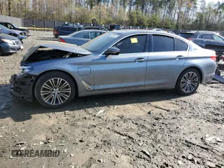 2019 BMW 5 Series 530e with VIN WBAJA9C50KB389398, listed as a Copart auction lot 52034125 with Not provided miles and Salvage title. Bid and sale history available at DreamBid. Image 1.