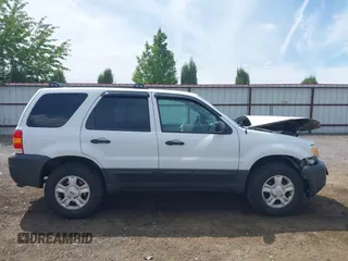 2006 Ford Escape XLT with VIN 1FMCU93106KA36063, listed as a IAAI auction lot 42610043 with 193,703 mi miles and . Bid and sale history available at DreamBid. Image 13.