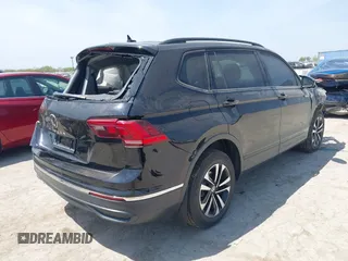 2022 Volkswagen Tiguan S with VIN 3VV1B7AX5NM030779, listed as a IAAI auction lot 41877605 with 39,261 mi miles and . Bid and sale history available at DreamBid. Image 4.
