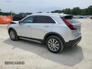 2019 Cadillac XT4 FWD Premium Luxury z VIN 1GYFZCR44KF195554, wystawiony jako Copart lot #55728095 z przebiegiem 35 948 mil mil oraz Nie do naprawy. Historia ofert i sprzedaży dostępna na DreamBid. Obrazek 2.