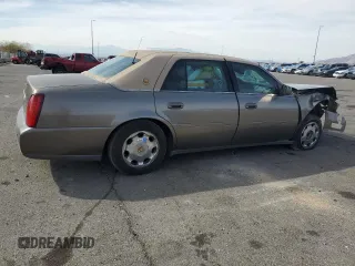 2002 Cadillac DeVille DHS z VIN 1G6KE57Y22U291523, wystawiony jako Copart lot #45711095 z przebiegiem 160 364 mil mil oraz Szkoda całkowita • Salvage title. Historia ofert i sprzedaży dostępna na DreamBid. Obrazek 3.