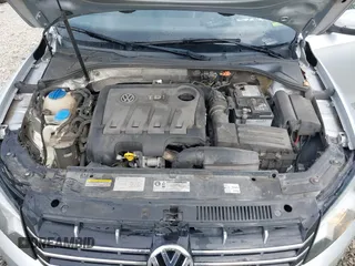2014 Volkswagen Passat SEL Premium z VIN 1VWCN7A34EC091762, wystawiony jako IAAI lot #41769129 z przebiegiem 106 779 mil mil oraz . Historia ofert i sprzedaży dostępna na DreamBid. Obrazek 10.